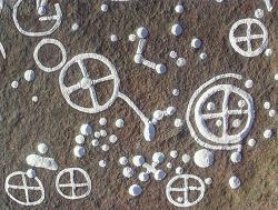 art depicts Celtic sun wheels with dots, which represent
forts and round houses.